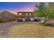 Picture of the home's backyard featuring low-maintenance desert landscaping and a covered patio at 7725 S 47Th Ln, Laveen, AZ 85339