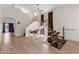 Spacious bonus room featuring a home gym, ceiling fan, and ample natural light at 7725 S 47Th Ln, Laveen, AZ 85339