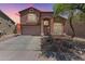 Inviting two-story home featuring desert landscaping and a convenient two-car garage at 7725 S 47Th Ln, Laveen, AZ 85339
