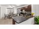 Kitchen and Dining room area with modern appliances and natural lighting at 7725 S 47Th Ln, Laveen, AZ 85339