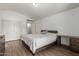 The main bedroom features a vaulted ceiling, laminate floors, and an abundance of space at 7725 S 47Th Ln, Laveen, AZ 85339