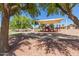 Shaded playground area in community park, perfect for families to enjoy at 7725 S 47Th Ln, Laveen, AZ 85339