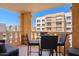Balcony features a table with seating and a view of the neighborhood at 7920 E Camelback Rd # 508, Scottsdale, AZ 85251