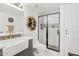 Modern bathroom featuring a vessel sink, waterfall faucet, and a stylish walk-in shower at 7920 E Camelback Rd # 508, Scottsdale, AZ 85251