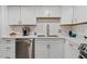 Updated kitchen with stainless steel appliances and white cabinets is ready for the next home chef at 7920 E Camelback Rd # 508, Scottsdale, AZ 85251