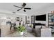 Spacious living room with large windows and neutral tones flows into the updated kitchen at 7920 E Camelback Rd # 508, Scottsdale, AZ 85251