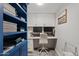 Home office with built in shelving and modern decor for the perfect work from home space at 7920 E Camelback Rd # 508, Scottsdale, AZ 85251