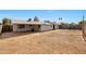 Large backyard with a covered patio, perfect for outdoor gatherings and entertainment at 8202 W Turney Ave, Phoenix, AZ 85033