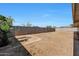 Spacious backyard area enclosed by a block wall, offering privacy and potential for various outdoor activities at 8202 W Turney Ave, Phoenix, AZ 85033