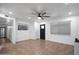 Bright living room with tile flooring, ceiling fan, and well-lit interior, creating a welcoming space at 8202 W Turney Ave, Phoenix, AZ 85033