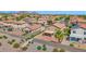 Backyard featuring gravel landscaping, covered patio, privacy fence, and a lawn at 885 E Lakeview Dr, San Tan Valley, AZ 85143