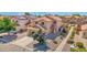 Two-story home with neutral stucco, tile roof, desert landscaping, and a two car garage at 885 E Lakeview Dr, San Tan Valley, AZ 85143