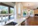 Stylish living room with views of pool. Natural light and open floorplan at 9571 E Nittany Dr, Scottsdale, AZ 85255