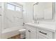 Bright bathroom with marble tile shower and modern white vanity at 11008 N 119Th Pl, Scottsdale, AZ 85259
