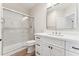 Bathroom featuring a glass enclosed shower, tile accent wall, and modern vanity at 11008 N 119Th Pl, Scottsdale, AZ 85259