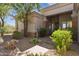 Inviting front entrance featuring stone accents and desert landscaping that enhances curb appeal at 11008 N 119Th Pl, Scottsdale, AZ 85259