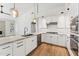 Bright kitchen features stainless appliances, custom cabinets, and a tile backsplash at 11008 N 119Th Pl, Scottsdale, AZ 85259