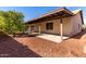 Home showcasing a landscaped backyard with a covered patio at 11065 W Runion Dr, Peoria, AZ 85373