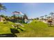Beautiful community park offering picnic areas around a scenic pond with water fountain at 11065 W Runion Dr, Peoria, AZ 85373