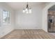 The dining room offers natural light and is adjacent to the kitchen at 11065 W Runion Dr, Peoria, AZ 85373