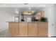 Open kitchen with granite countertops and stainless steel appliances at 11065 W Runion Dr, Peoria, AZ 85373