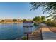 Beautiful Lake Burnett with community signage outlining rules and resident access at 11065 W Runion Dr, Peoria, AZ 85373