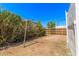 Backyard with vegetation, dirt, and metal clothing line at 1118 N 18Th St, Phoenix, AZ 85006