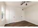 Vacant bedroom with wood-look floors and two doors at 1118 N 18Th St, Phoenix, AZ 85006