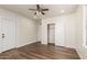 Vacant bedroom featuring dark wood-look floors, recessed lighting, and closet doors at 1118 N 18Th St, Phoenix, AZ 85006