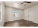 A vacant room with a window and wood-look flooring at 1118 N 18Th St, Phoenix, AZ 85006
