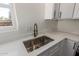The kitchen features modern white countertops with an undermount sink at 1118 N 18Th St, Phoenix, AZ 85006