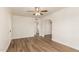 Bright living room featuring new light-colored walls, wood floors, and an arched entry at 1118 N 18Th St, Phoenix, AZ 85006
