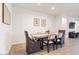 Dining room with modern furniture and decor at 11951 W Wier Ave, Avondale, AZ 85323
