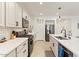 Open concept kitchen with stainless appliances, granite countertops, and tile backsplash at 11951 W Wier Ave, Avondale, AZ 85323