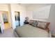 Comfortable bedroom featuring natural light, carpet, and decoratively appointed closet for relaxing at 12550 W Luxton Ln, Avondale, AZ 85323