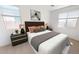 Comfortable bedroom with neutral tones, soft lighting, and a relaxing ambiance at 12550 W Luxton Ln, Avondale, AZ 85323