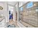Spa-like bathroom features a spacious walk-in shower and walk-in closet at 12932 W Cassia Trl, Peoria, AZ 85383