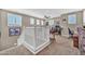 Spacious bonus room with a desk, multiple windows, and a ceiling fan at 12932 W Cassia Trl, Peoria, AZ 85383