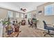 Versatile bonus room providing ample space for a variety of activities, with multiple windows and natural light at 12932 W Cassia Trl, Peoria, AZ 85383