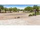 Well-maintained common area with desert landscaping, providing a tranquil and natural setting at 13216 W Desert Ln, Surprise, AZ 85374