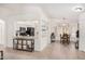 Kitchen and dining area featuring tile floors and seamless integration at 13216 W Desert Ln, Surprise, AZ 85374