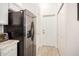 This kitchen is equipped with stainless steel appliances, granite counter tops, and access to a pantry at 13216 W Desert Ln, Surprise, AZ 85374