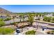 Overhead view of the residence, showing the roof, yard, driveway and neighborhood at 1326 W Joan De Arc Ave, Phoenix, AZ 85029