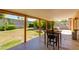 Inviting covered patio with room for seating, ideal for enjoying the outdoors in comfort at 1326 W Joan De Arc Ave, Phoenix, AZ 85029