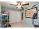 Exercise room with yoga mats, weights, and equipment plus ample closet space for storage at 1326 W Joan De Arc Ave, Phoenix, AZ 85029