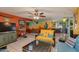 Inviting living room with colorful wall accents, comfortable sofas, and tile flooring at 1326 W Joan De Arc Ave, Phoenix, AZ 85029