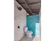 Modern bathroom showcases a stylish toilet, a rain shower head, and a geometric patterned accent wall at 14012 N 57Th Pl, Scottsdale, AZ 85254