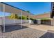 Attached carport provides covered parking with a painted aluminum covering, and backyard access at 14012 N 57Th Pl, Scottsdale, AZ 85254