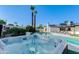 Tranquil backyard featuring a luxurious hot tub and a sparkling pool, creating an ideal retreat at 14012 N 57Th Pl, Scottsdale, AZ 85254