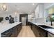 Beautiful kitchen featuring a large island, modern appliances, designer backsplash, and ample counter space at 14012 N 57Th Pl, Scottsdale, AZ 85254